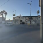 Vista panoramica del complesso conventuale dei Cappuccini di Siracusa da una rotonda di via Puglia, con il campanile a vela, palme alte e la facciata laterale al tramonto